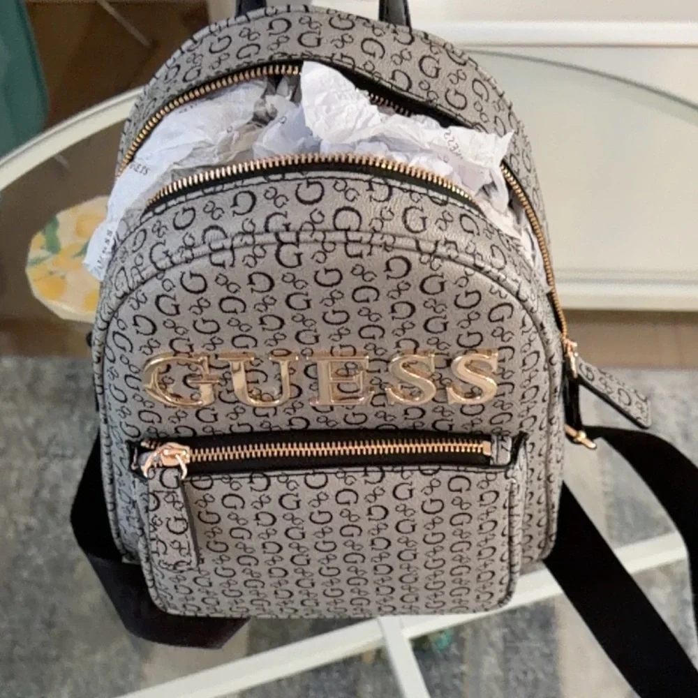 GUESS Black and Gold Patterned Backpack - Picture 6 of 7